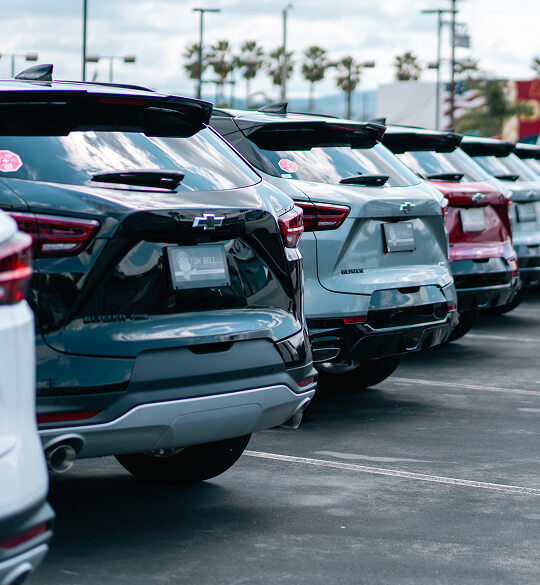 Close-up of vehicle rear showing R1 badge, used for Sales Support
